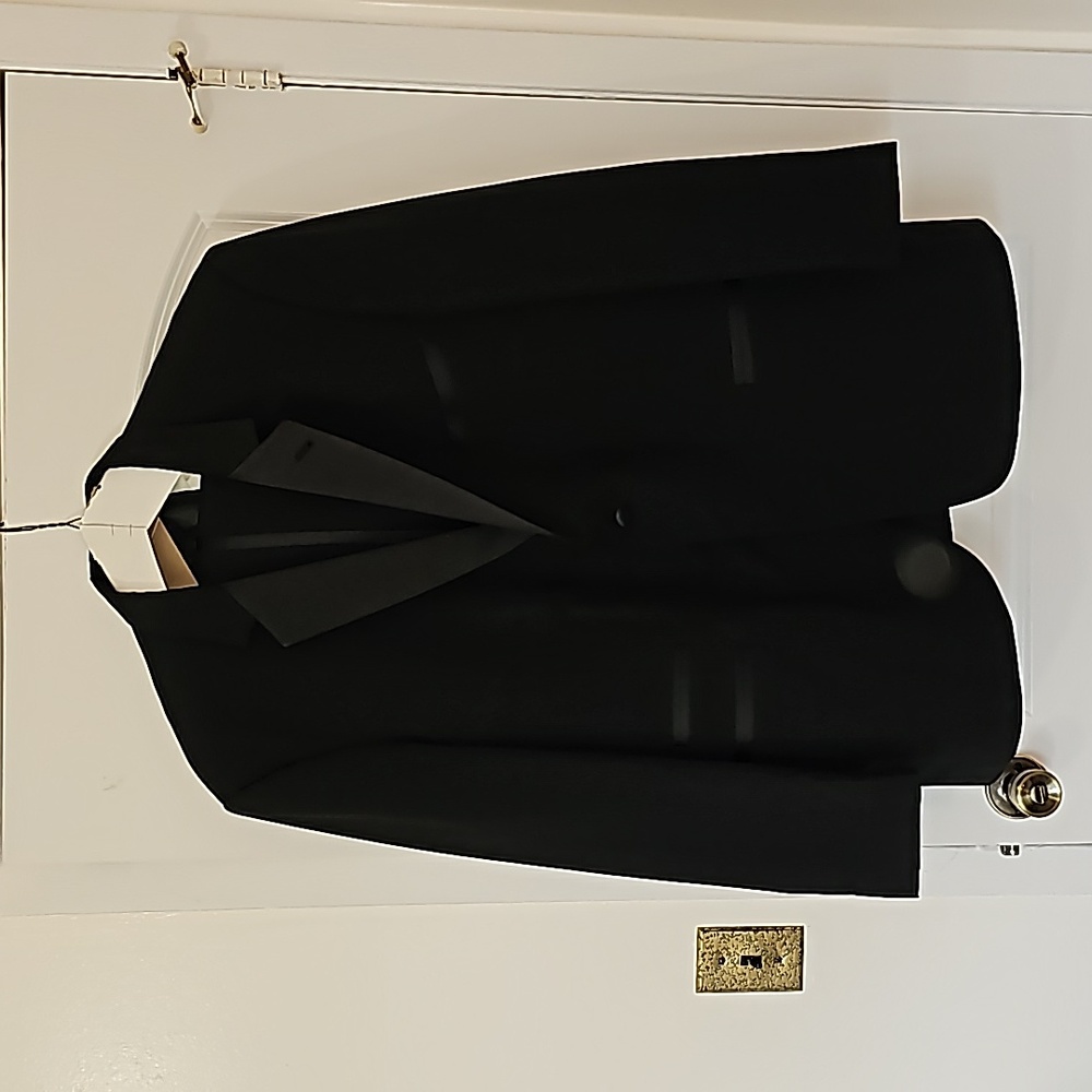 Perry Ellis Black Tuxedo sold at Mitchell's Formal Wear.